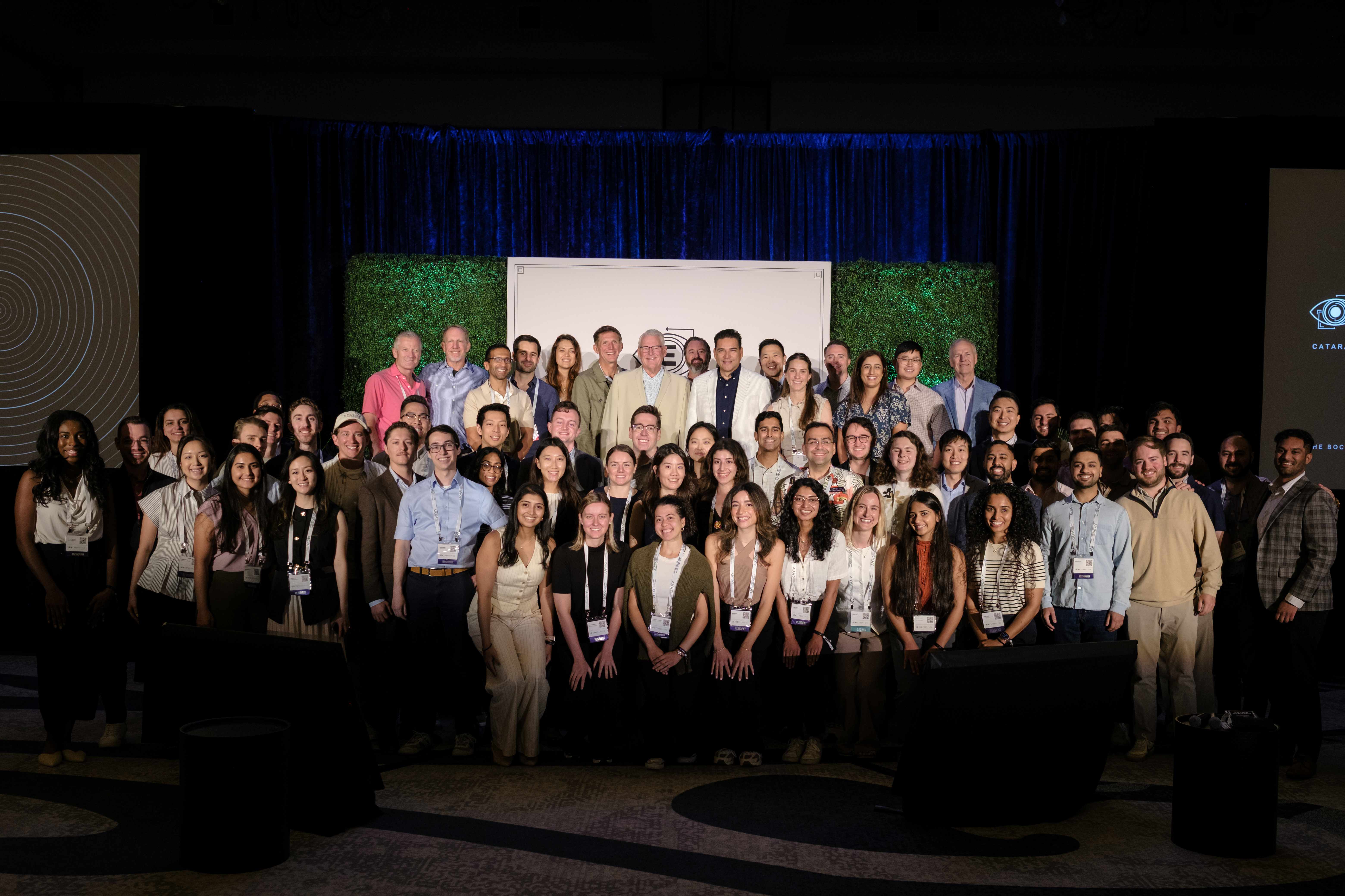 The full class of residents, faculty, and program directors on stage at the 2026 Showcase